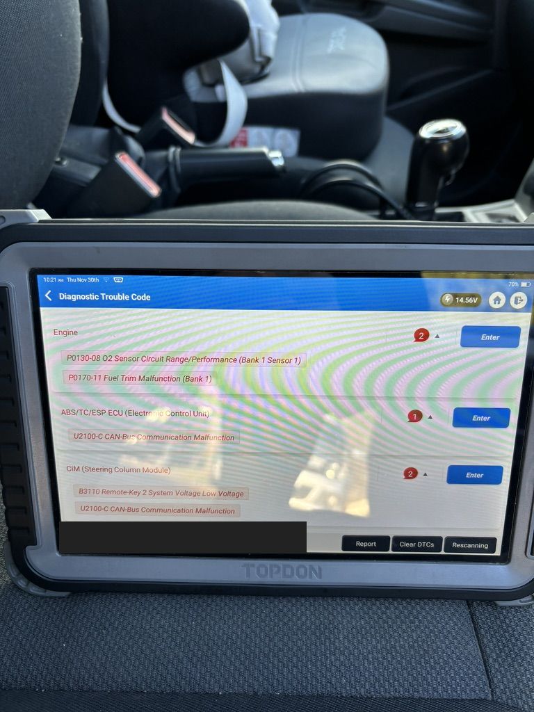 TOPDON tablet showing P0130 O2 sensor circuit range performance code with a fuel trim fault on a 2007 Astra H