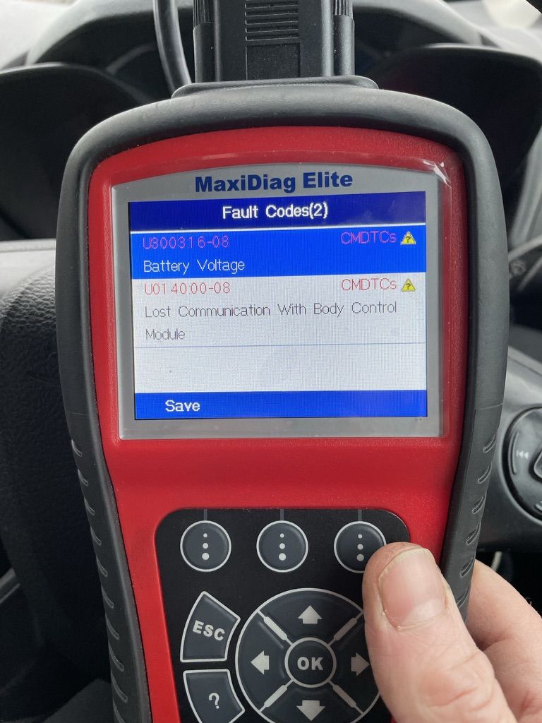 Autel MaxiDiag showing U0140 lost communication with body control module and a battery voltage code