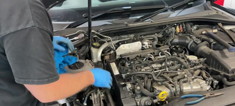 Removing the DPF pressure sensor pipes from the top of the Audi A3 1.6 TDI engine