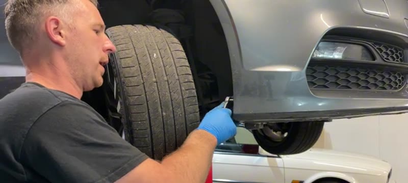 Removing the front wheel to access the inner arch liner on the Audi A3