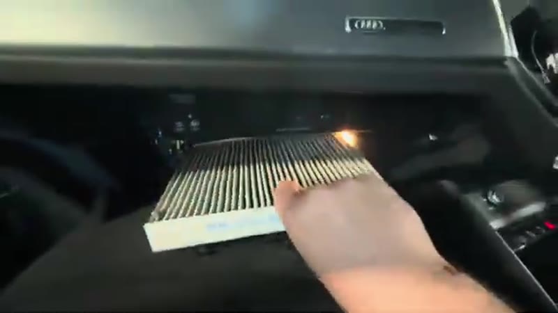 Removing the dirty old pollen filter from the Audi Q3 housing