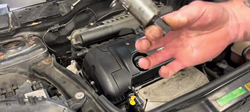 Pulling the old Vanos solenoid out of the BMW Mini engine