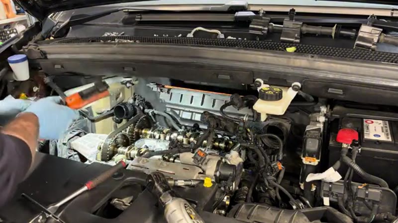 Removing the cam carrier to expose the camshafts on the 1.2 PureTech engine