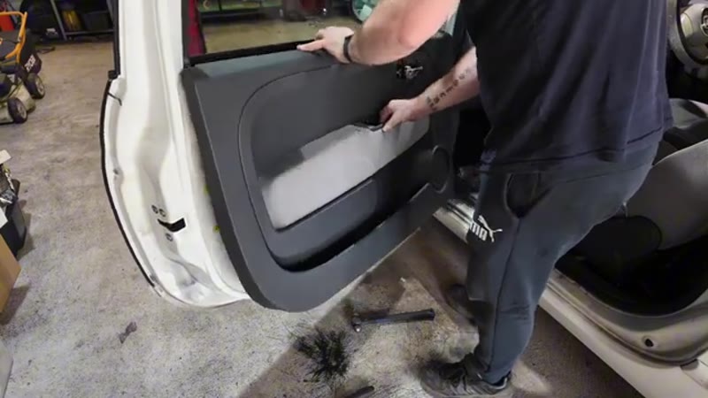 Refitting the Fiat 500 door card after resealing the vapour membrane