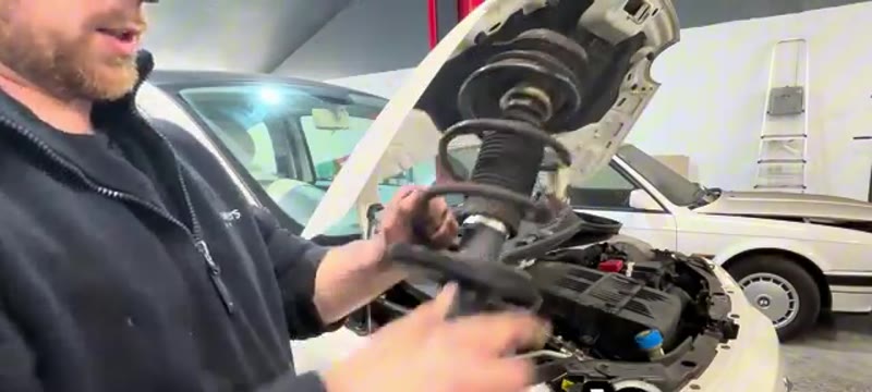 The Fiat 500 spring and top mount swapped onto the new shock absorber