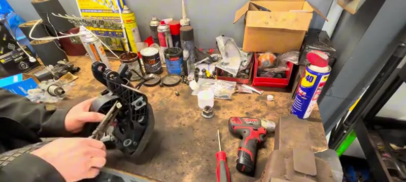 Separating the clutch master cylinder from the Ford Fiesta pedal assembly on the bench