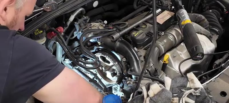 Rechecking the timing pins after rotating the Ford Focus engine by hand