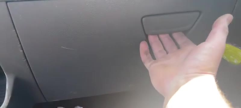 Opening the passenger glove box on a Ford Transit 2021