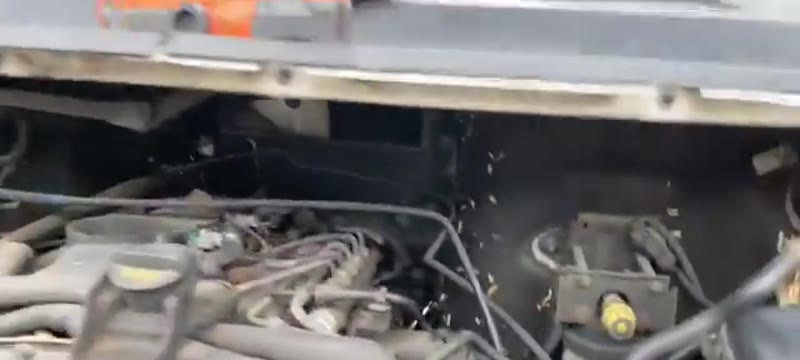 Air box removed from the Ford Transit 2.4 engine bay, giving a clear view of the EGR valve below