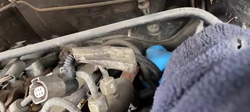 Removing the remaining top mounting bolts from the Transit EGR valve