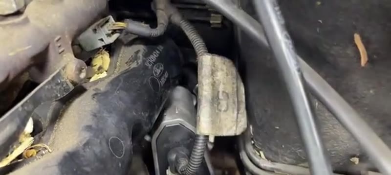 EGR valve bolted down with the coolant hoses and electrical connector refitted