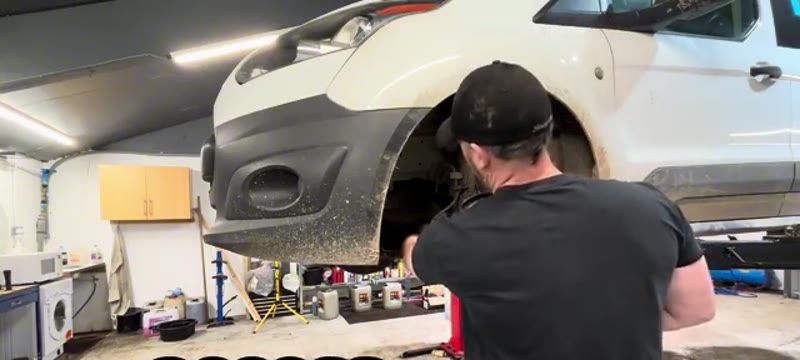 Removing the undertray Torx bolts beneath the Ford Transit Connect with the wheel off