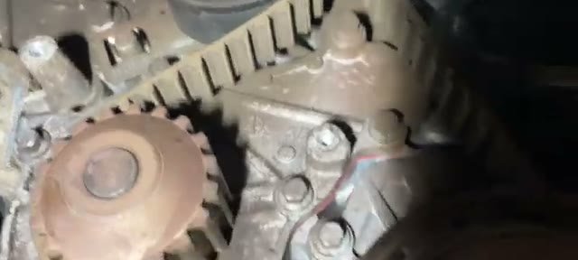 Ford Transit Connect timing belt with the teeth stripped away around the crank sprocket