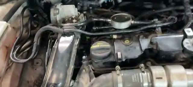 The rebuilt Transit Connect engine bay fully reassembled after the timing belt failure repair