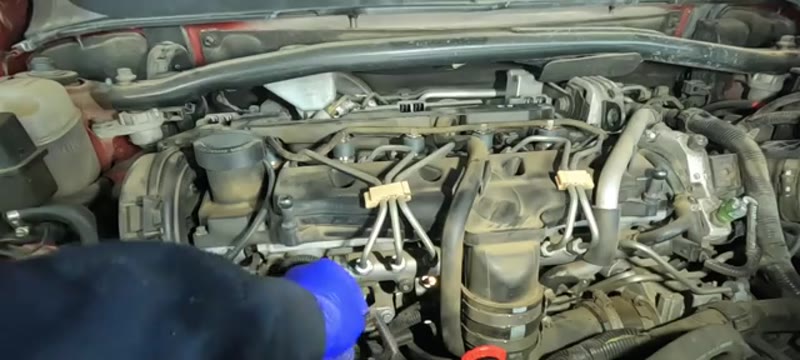 Pulling the electrical connector off the end of a glow plug