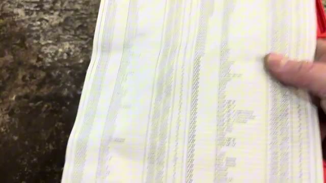 Checking the pressure tester kit chart for the correct expansion tank cap adapter
