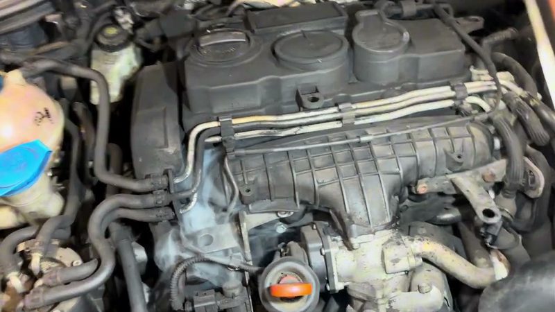 Smoke escaping from the inlet side of the Audi A3 engine during the test