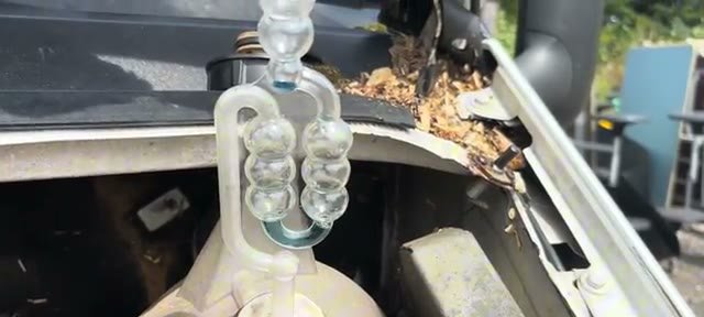 Air from the cooling system bubbling up through the tester's fluid chambers