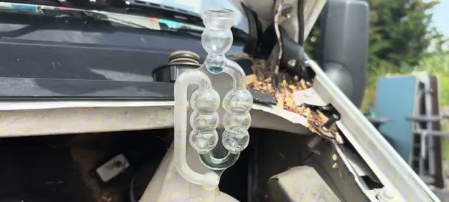 Test fluid turned greeny-yellow confirming combustion gases in the Transit's cooling system