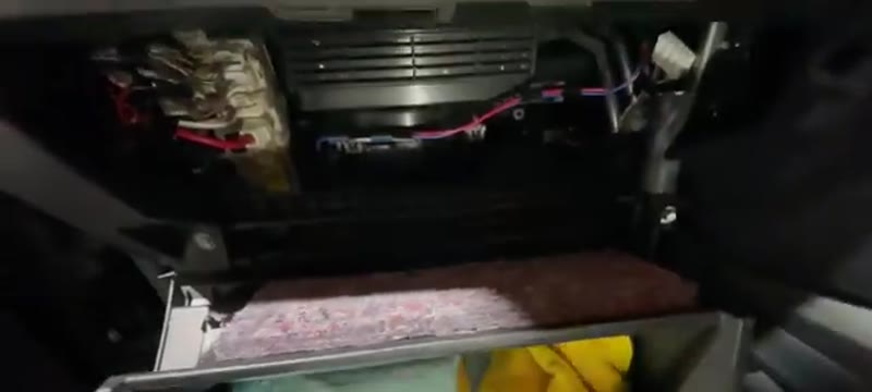 Glove box dropped fully down on the Mitsubishi L200 revealing the cabin filter housing