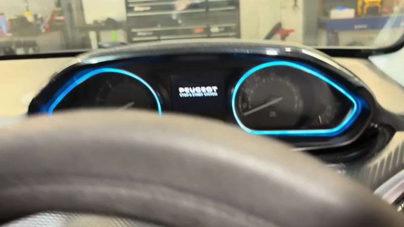 Peugeot 2008 instrument cluster lit up with the ignition on, ready to reset the service indicator