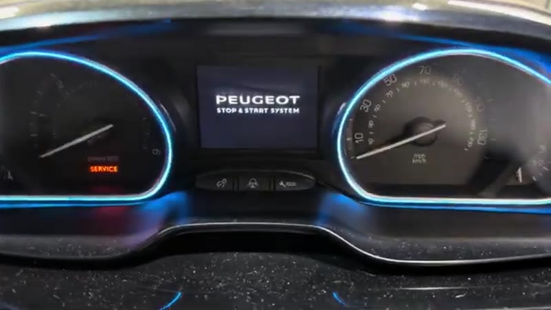 Orange service spanner indicator showing on the Peugeot instrument cluster