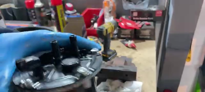 Filling the reassembled fuel filter housing with diesel before refitting to the Captur