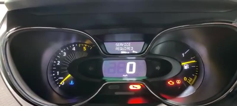 Renault Captur instrument cluster showing the service required message with the ignition on