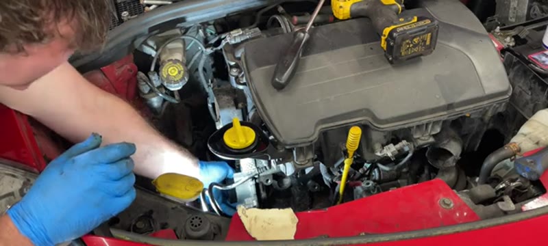 Fitting the new water pump and gasket to the Renault Clio engine block