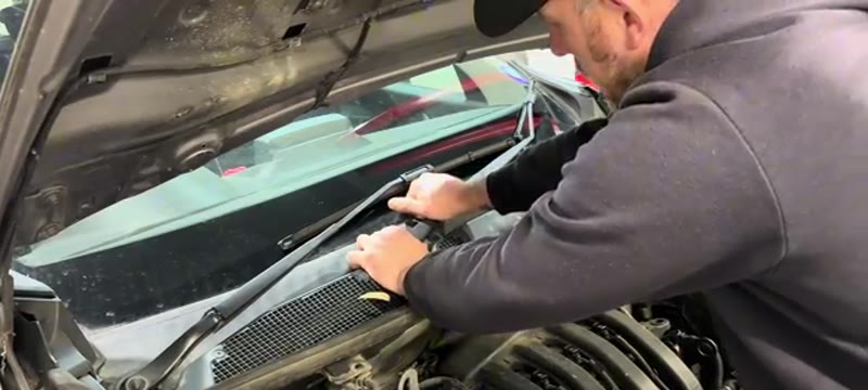 Removing the wiper arms from the scuttle area on a Renault Megane