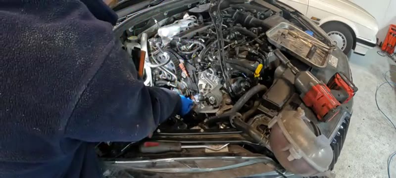 Fitting the new water pump with its fresh O-ring seal to the Superb engine