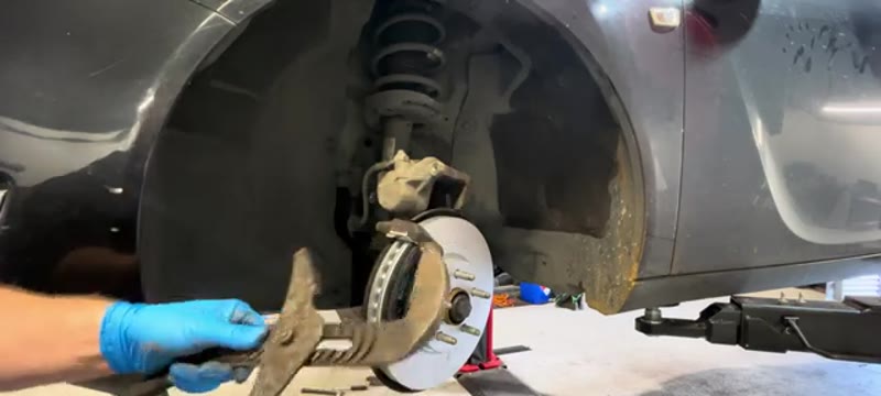 Winding the caliper piston back before refitting the caliper on the Vauxhall Insignia