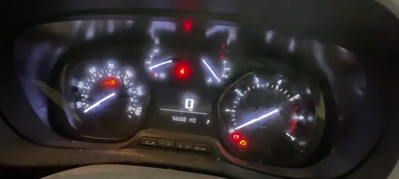 Vauxhall Vivaro instrument cluster with the ignition on showing the service spanner light