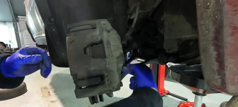 Undoing the Volvo XC90 caliper slider pins with a 7mm Allen key
