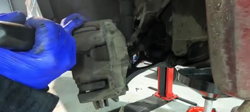 Pushing the Volvo XC90 brake caliper piston back with steady pressure