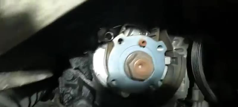 Checking the crank timing mark against the engine casing on the Volvo XC90 D5