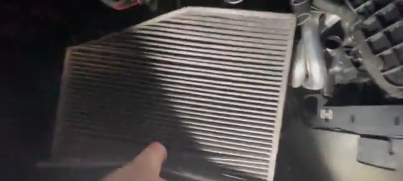 Pulling the dirty old pollen filter out of the VW Caddy housing
