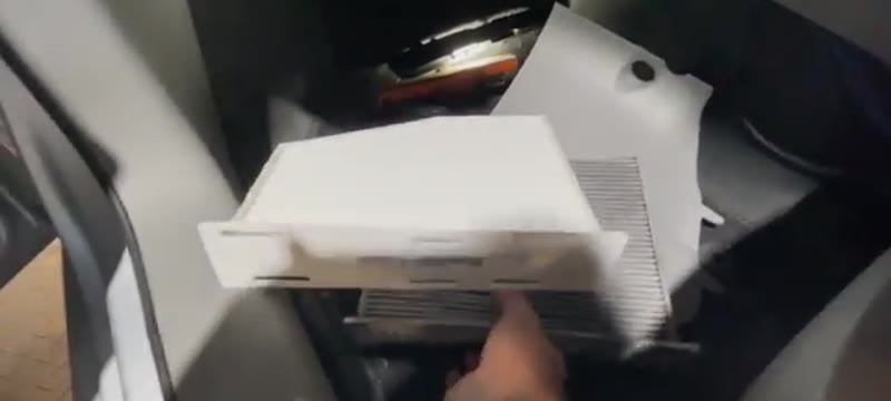 Fitting the clean new pollen filter up into the VW Caddy housing