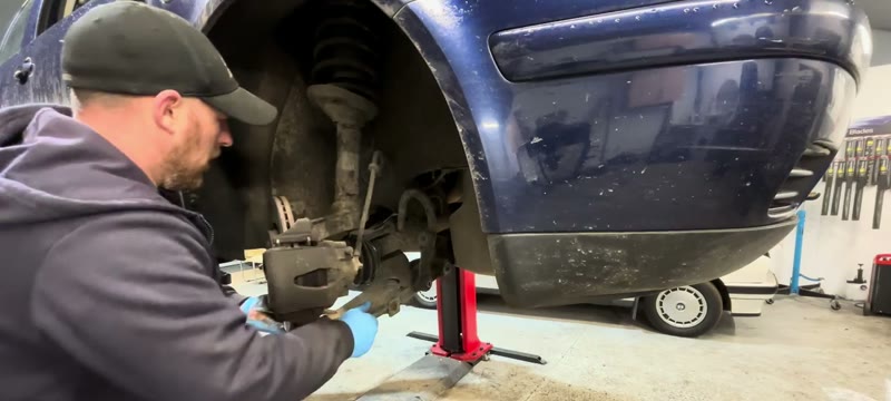 Loosening the Mk4 Golf hub nut so the driveshaft can be pushed back for clearance