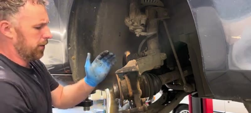 Wire brushing the hub mating surface clean before fitting the new disc