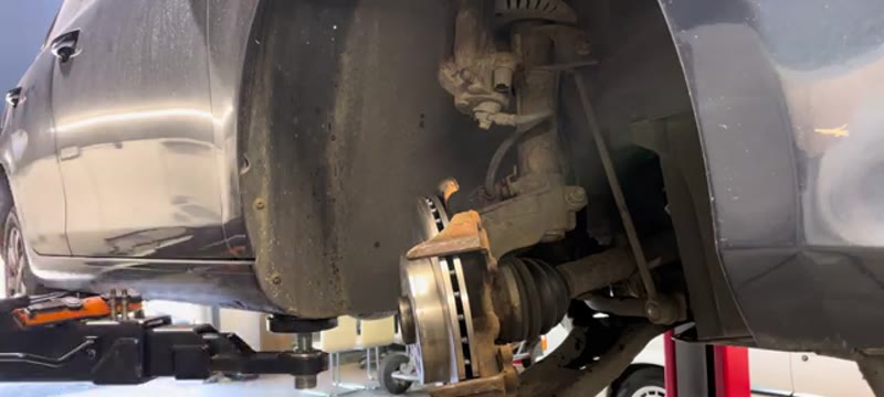 New brake disc fitted on the VW Golf Mk6 hub