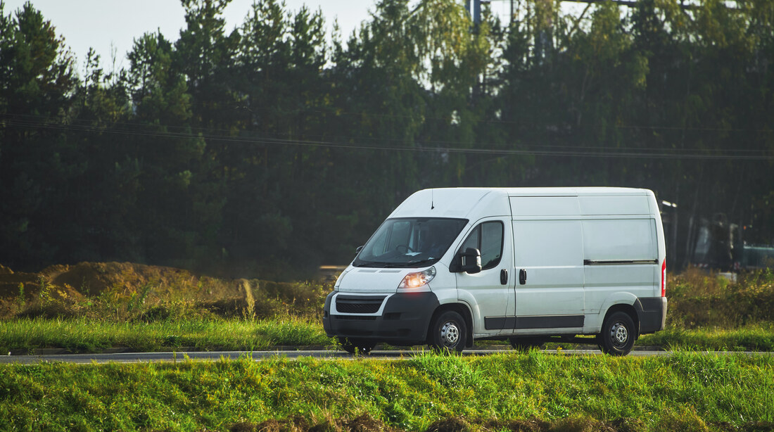 White panel van parked, representing the Ford Transit Custom